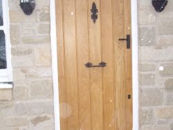 Oak and snow door