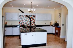 Painted and granite kitchen