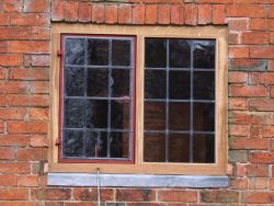Oak window with metal casements